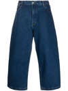 Studio Nicholson Cropped Wide Leg Denim Trousers In Blue