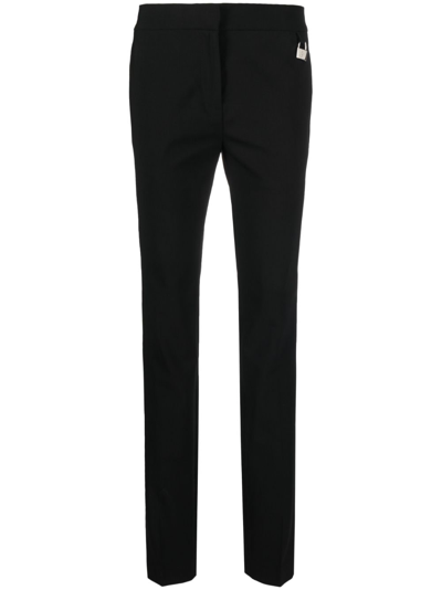 Jw Anderson Padlock-embellished Slim-leg Trousers In Black