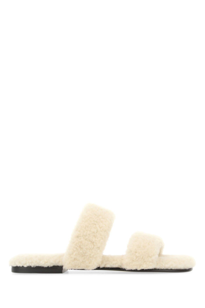 Saint Laurent Bleach Shearling Slides In Avorio