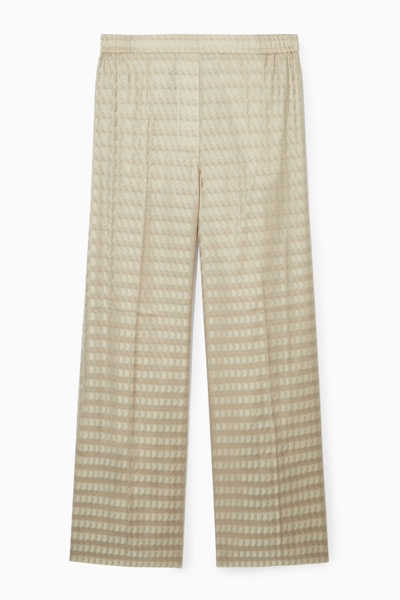 Cos Geometric-jacquard Satin Trousers In Beige