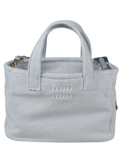 Miu Miu Logo Embossed Top Handle Shopper Bag In Cielo