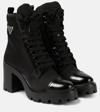 Prada 90mm Triangle-logo Ankle Boots In Black