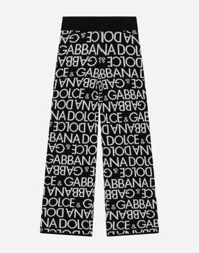 Dolce & Gabbana Knit Pants With All-over Jacquard Logo In Multicolor