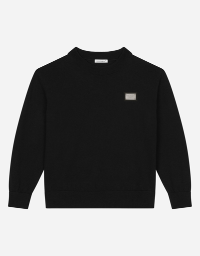 Dolce & Gabbana Round-neck Plain Knit Sweater With Logo Tag In Black