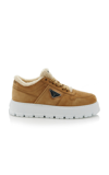 Prada Suede Shearling Platform Sneakers In Tan