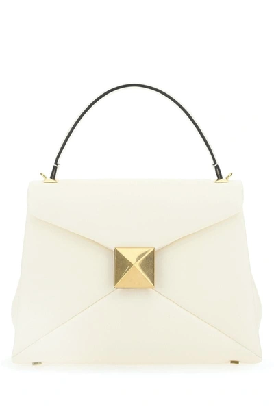 Valentino Garavani Handbags. In White