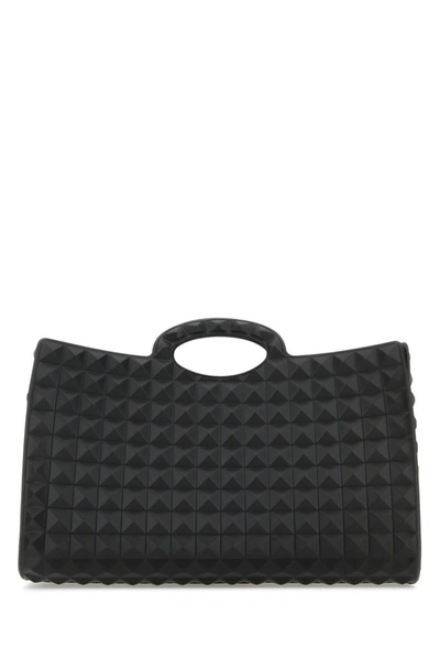 Valentino Garavani Handbags. In Black