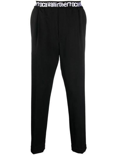 Roberto Cavalli Logo-waist Tapered Trousers In Black