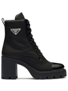 Prada Monolith Leather And Nylon Ankle Boots In Black
