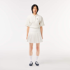 Lacoste Short Pleated Button Waist Skirt - 36 In White