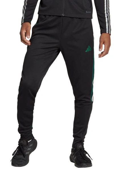 Adidas Originals Sportswear Tino Track Pants In Black/ Team Dark Green