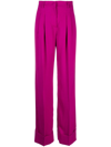 The Andamane Wide-leg Flared Trousers In Pink