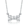 STELLA VALENTINO STERLING SILVER WITH 1.50CTW LAB CREATED MOISSANITE BOW-TIE HEART PENDANT LAYERING NECKLACE