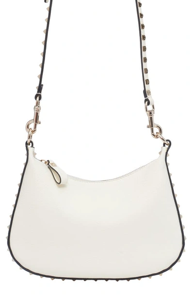 Valentino Garavani Small Rockstud Leather Hobo Bag In 098 Ivory