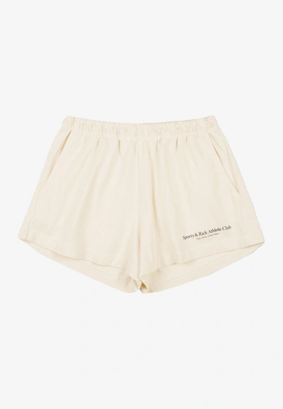 Sporty And Rich Athletic Club Cotton Disco Shorts In Cream