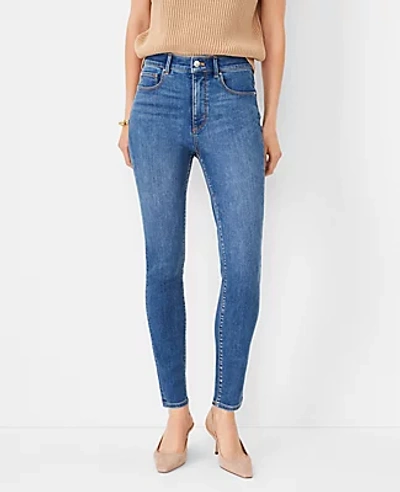 Ann Taylor Petite Curvy Sculpting Pocket High Rise Skinny Jeans In Classic Indigo Wash