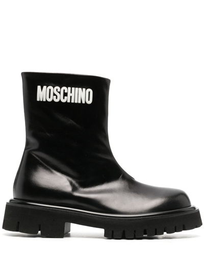 Moschino Embossed-logo Zipped Leather Boots In Black