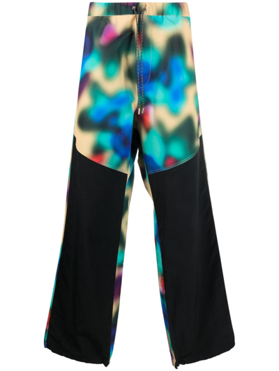 Oamc Panelled Abstract-print Drawstring Trousers In Grün