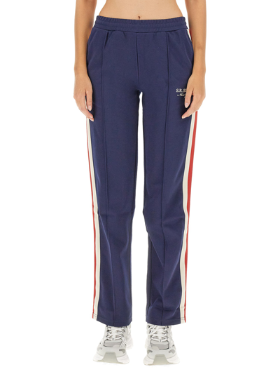 Sporty And Rich Brandie Embroidered Cotton-velour Track Trousers In Blue