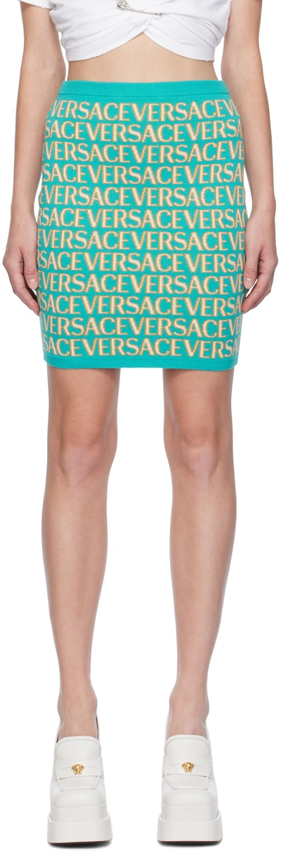 Versace Allover Logo-print Knitted Skirt In Turquoise