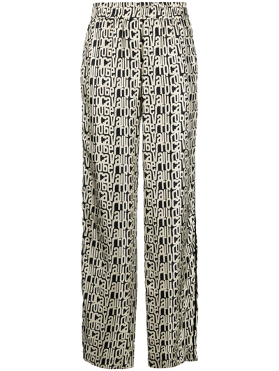 Roberto Cavalli All-over Logo Print Silk Trousers In Black