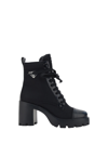 Prada Monolith Leather And Nylon Ankle Boots In Nero