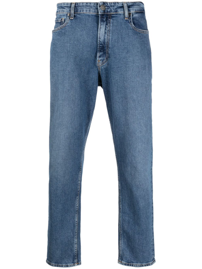 Calvin Klein Logo-patch Mid-rise Tapered Jeans In Blue