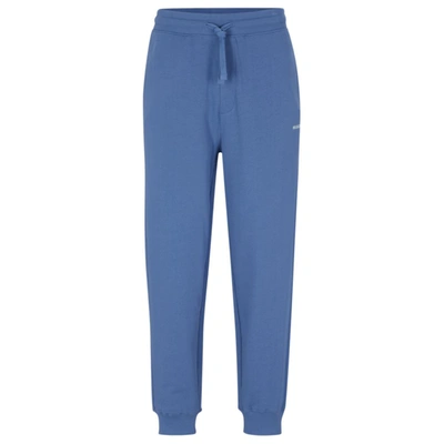 Hugo Boss Cotton-terry Tracksuit Bottoms With Logo Print In Blue