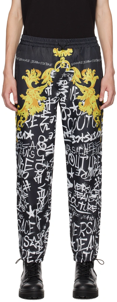 Versace Jeans Couture Black Graffiti Sweatpants In Eg89 Black + Gold