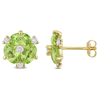 Amour 2 4/5 Ct Tgw Peridot And 1/4 Ct Tdw Diamond Oval Stud Earrings In 14k Yellow Gold