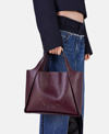 Stella Mccartney Logo Studded Grainy Alter Mat Tote Bag In Plum