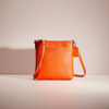 Coach Restored Kitt Messenger Crossbody In Brass/sun Orange