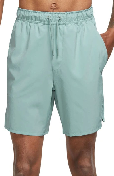 Nike Dri-fit Unlimited 7-inch Unlined Athletic Shorts In Green