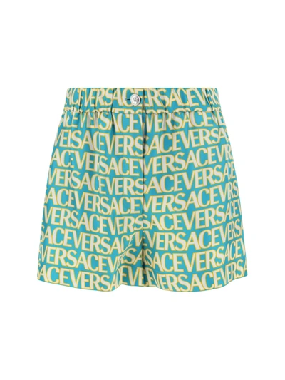 Versace Logo Print Silk Twill Shorts In Turquoise+avorio
