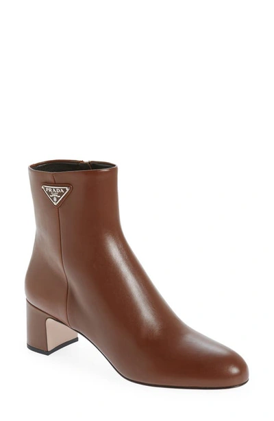 Prada Logo Block Heel Bootie In Cognac