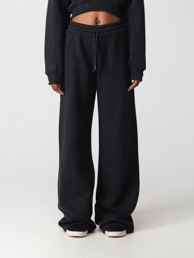 Off-white Trousers  Woman In Black