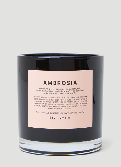 Boy Smells Ambrosia Candle In Blue