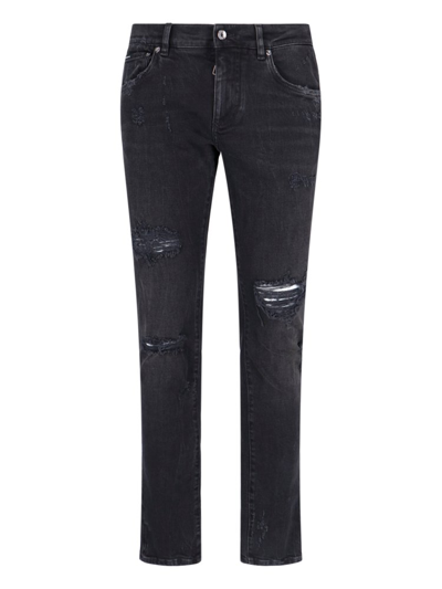 Dolce & Gabbana Logo Plaque Distressed Jeans In Black