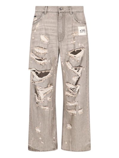 Dolce & Gabbana Logo Patch Distressed Jeans In Grey