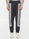 Balmain Monogram-scarf Drawstring Track Pants In Black