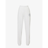 Sporty And Rich Lion Crest Brand-print Tapered-leg Relaxed-fit Stretch-cotton Jogging Bottoms In Heather Grey Navy