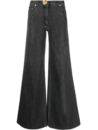 Moschino Flared-design Jeans In Black