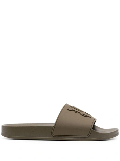 Palm Angels Embossed Monogram Slides In Brown
