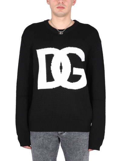 Dolce & Gabbana Ripped-detail Intarsia-knit Logo Sweater In Black