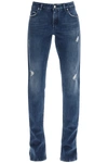 Dolce & Gabbana Destroyed Skinny Jeans With Engraved Metal Accents