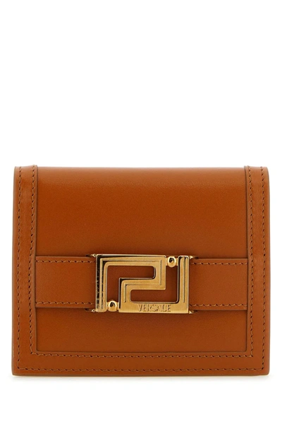 Versace Greca Goddess Leather Wallet In Brown