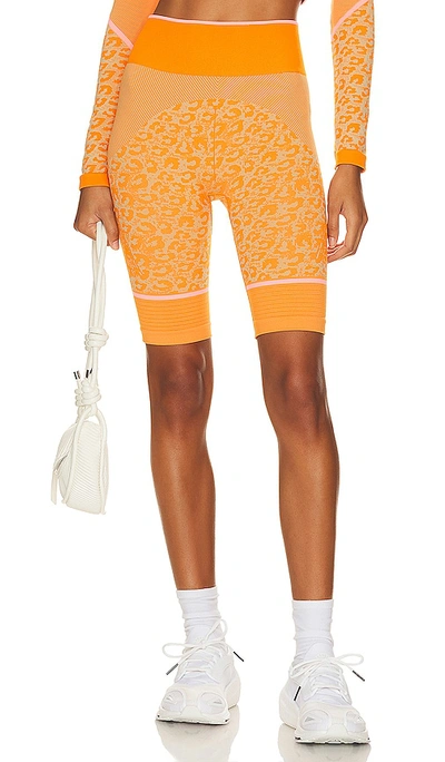 Adidas By Stella Mccartney True Strength Seamless Yoga Bike Legging In Orange