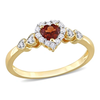 Mimi & Max 1/2 Ct Tgw Heart Shaped Garnet And Created White Sapphire With Diamond Accent Halo Promise Ring In Y In Red