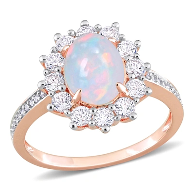 Mimi & Max 2 1/6 Ct Tgw Oval Shape Blue Ethiopian Opal And White Topaz And 1/10 Ct Tw Diamond Halo Ring In Rose In Multi