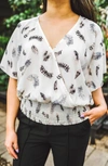 Veronica M Kimora Flutter Sleeve Faux Wrap Blouse In Ivory Feather Print In White